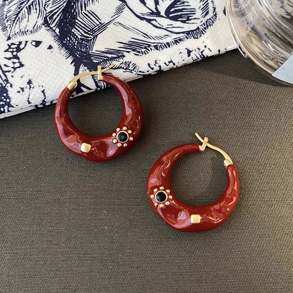 A pair of retro Hong Kong style alloy ear studs with rhinestone inlay, shown in black and red colour options.