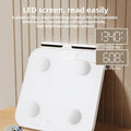 White tempered glass body fat scale with eight electrodes and LED display.