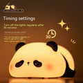 Rechargeable panda-shaped night light with warm white LED illumination and silicone construction