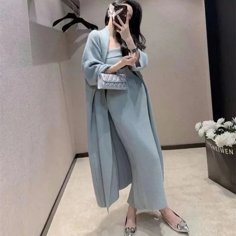 Women's grey knitted cardigan dress and coat suit set with flocking pattern detail.