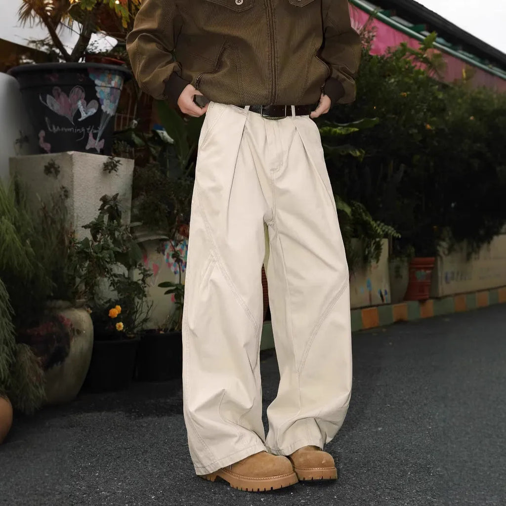 Men's pleated straight trousers in apricot colour with elastic waistband and loose fit