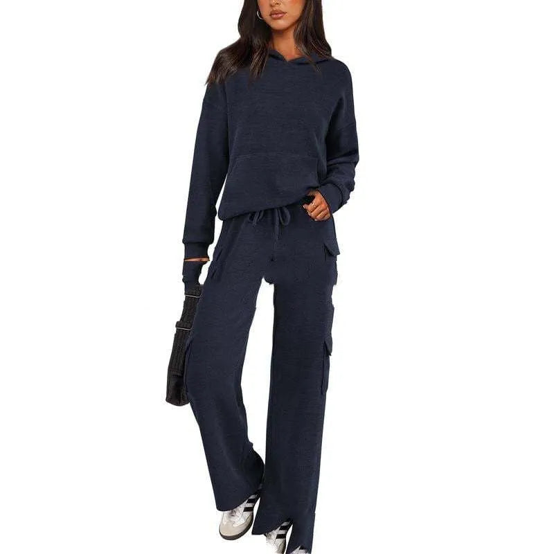 Women's long sleeve leisure sport suit top and trousers set in polyester fabric.