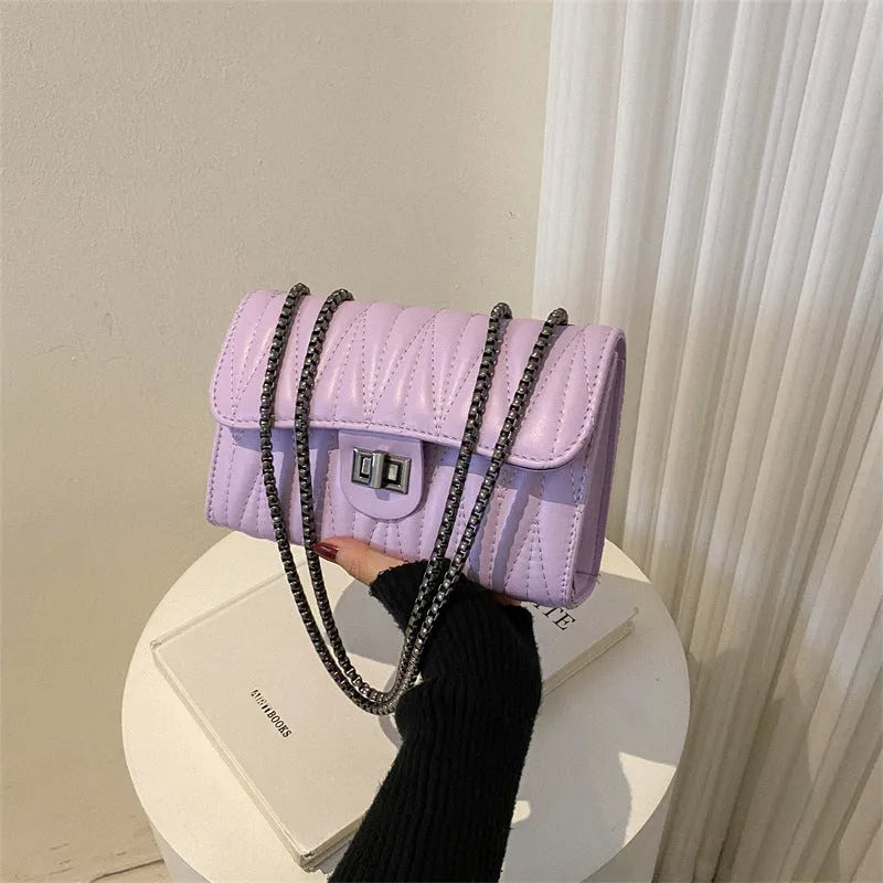 Retro textured diamond pattern small PU leather bag in a horizontal square shape, shown in beige colour.
