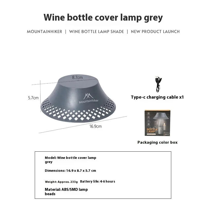Beige wine bottle camping lantern with USB-C charging port and adjustable light modes on a wooden surface.