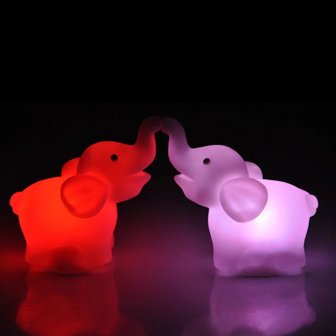 Elephant night light showing 7 colour changing modes with slow flash, vinyl body, 8x8.8x4.5cm size, battery powered