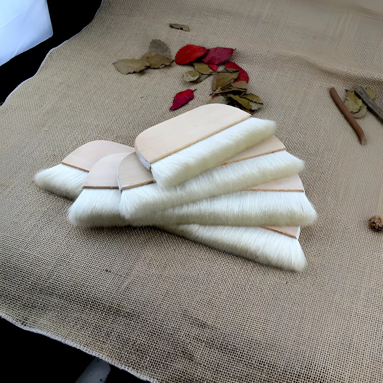 Wool fibre art brush for mounting paste and shading in picture colour.