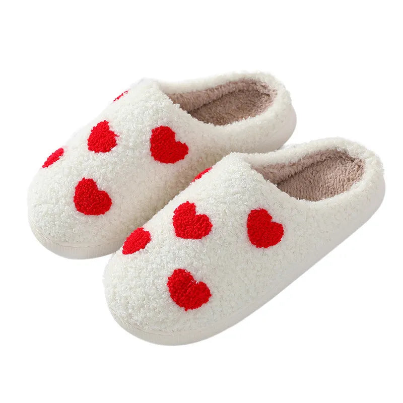 Plush women's slippers in Big Love colour with non-slip PVC sole and round toe.