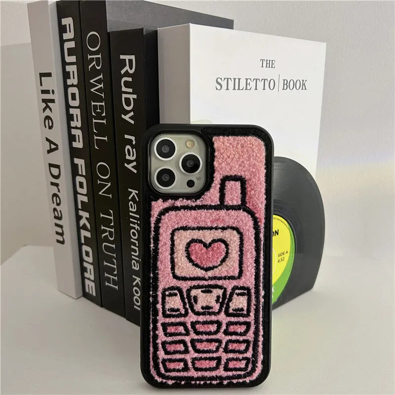 Pink towel embroidered TPU phone case for iPhone showing textured back surface and camera cutouts