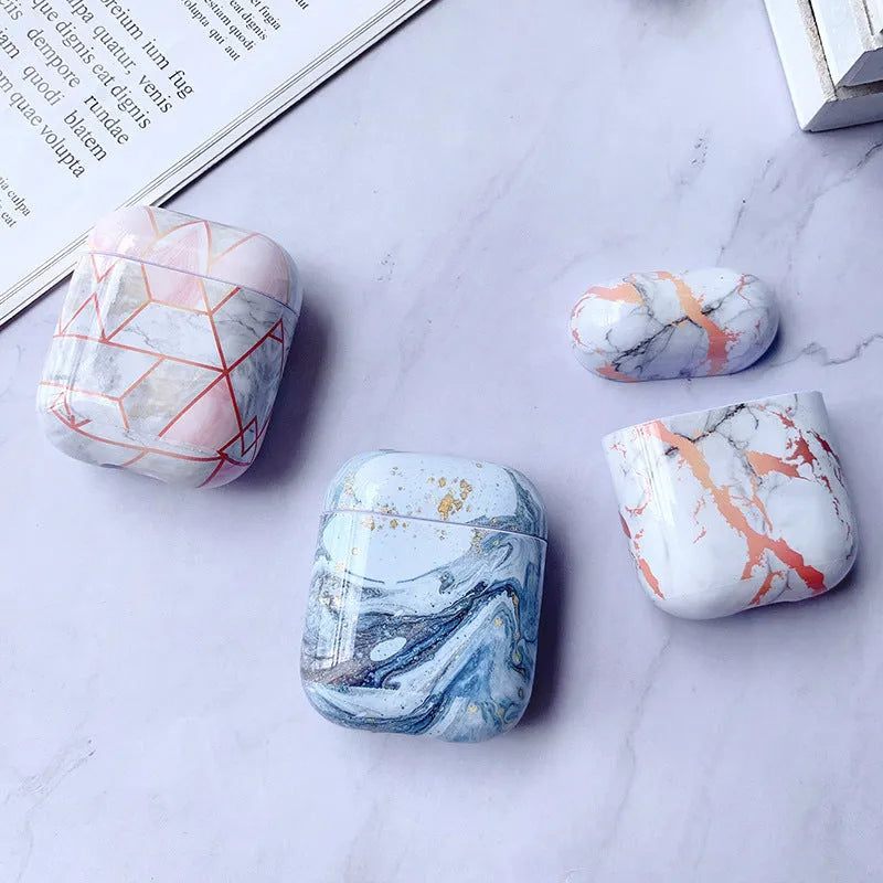 White marble protective case for Apple AirPods charging box showing hard PC construction