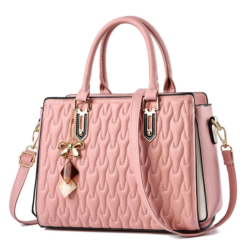 Women's messenger shoulder bag in gold colour showing outer pocket sandwich design and organised interior compartments