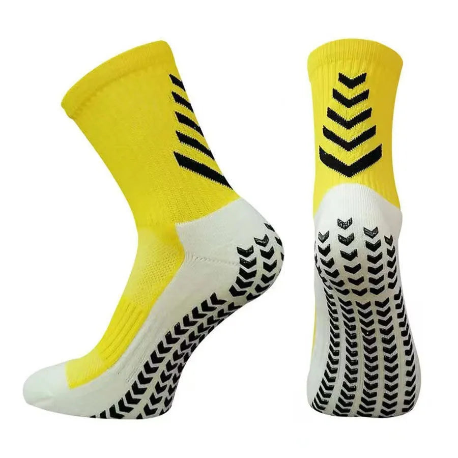 Men's mid-calf athletic socks with geometric patterns and silicone grip for running sports