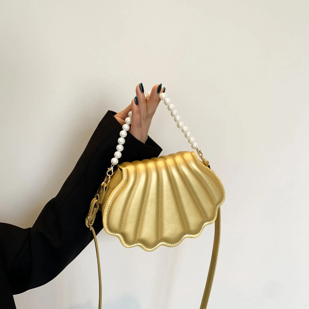 Women's simple messenger bag in PU shell shape with single shoulder strap, available in multiple colours
