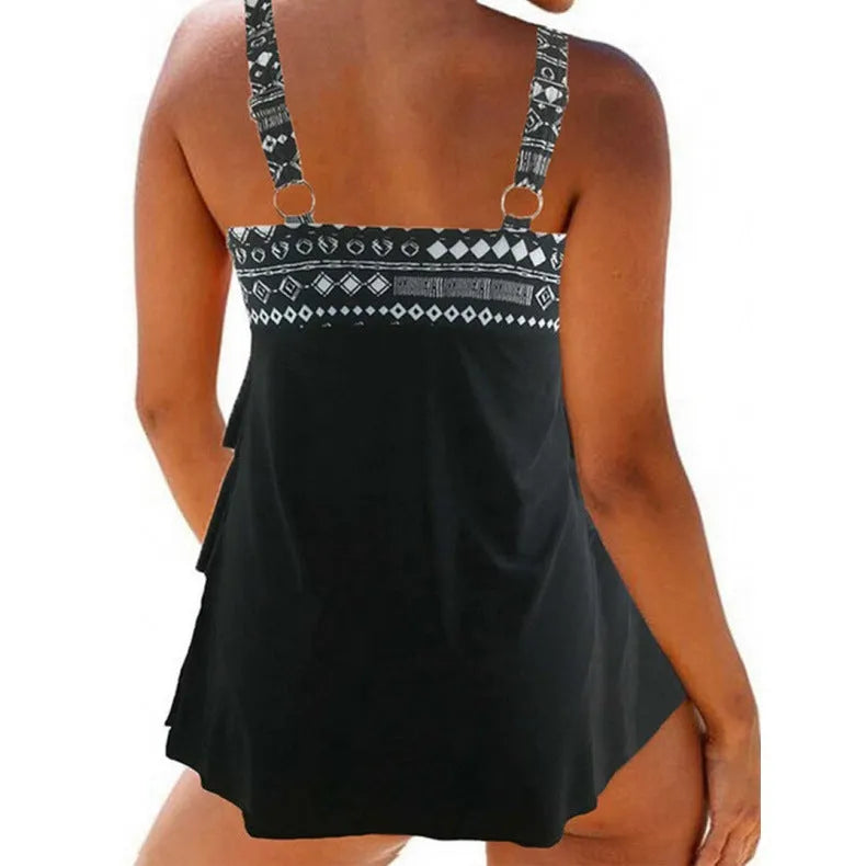 Women's plus size two-piece split swimsuit with double shoulder straps and a decorative bow.