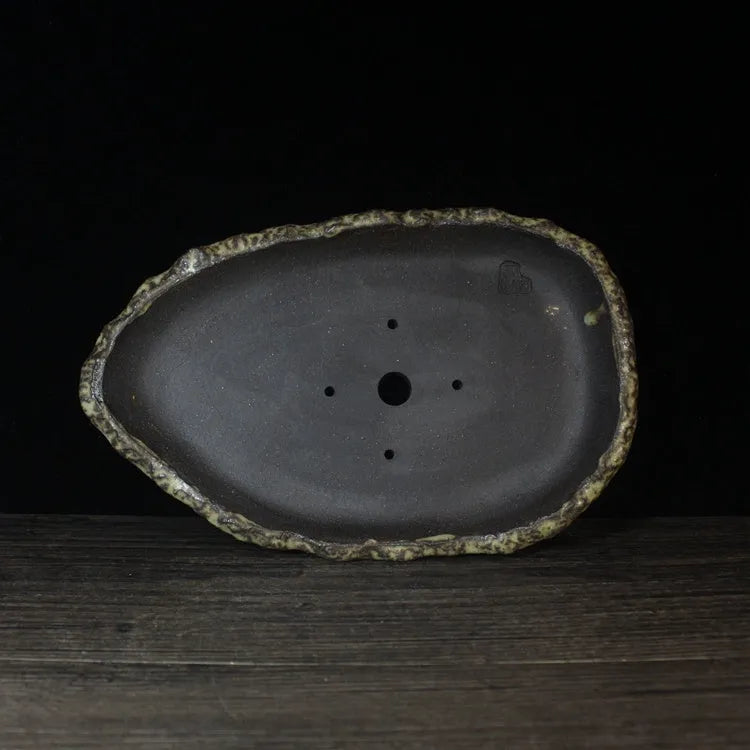 Handmade purple clay flowerpot showing colour style options and drainage hole choices for indoor plants.