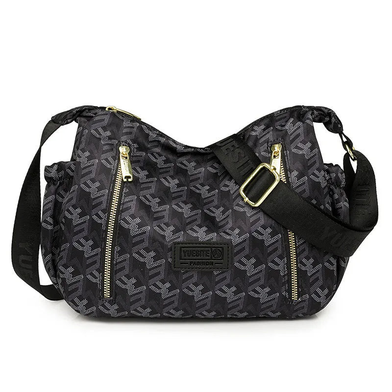 Graffiti casual crossbody bag in nylon with sewing line and print details, medium-soft build, single strap, dumpling shape