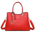 Women's black PU leather multi-compartment shoulder messenger bag with adjustable strap.