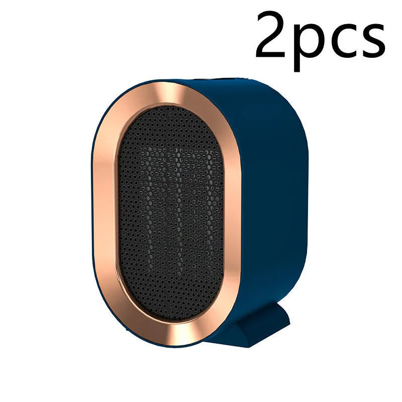 Desktop electric heater with cast metal housing and rotating air outlet in various colour options