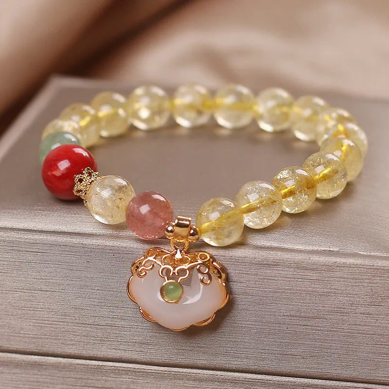 Women's alloy bracelet with a yellow citrine jade ruyi pendant in an original design.
