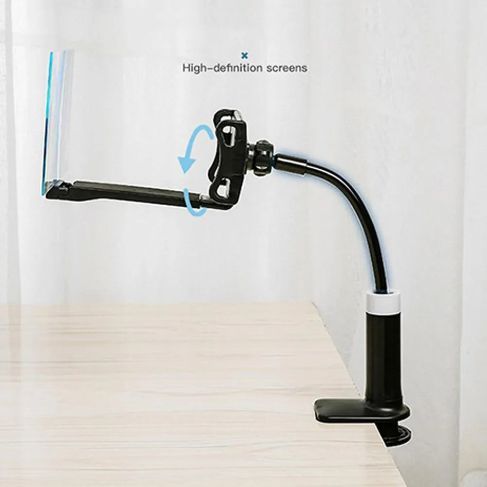 Black 12-inch mobile phone screen amplifier with adjustable bracket on a table.