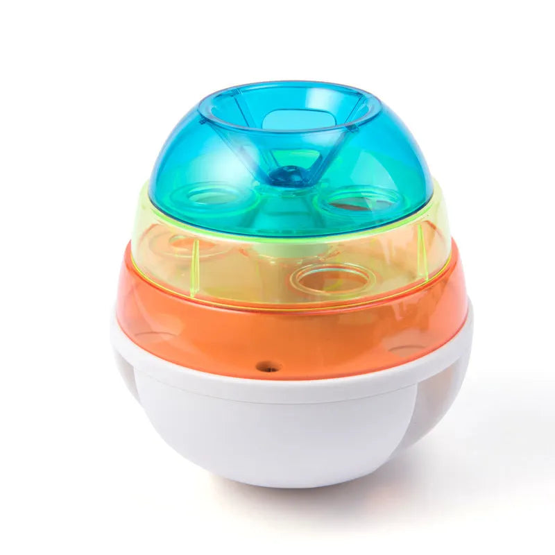 Dog leak food toy ball in photo colour, non-slip base, 12.5cm bottom diameter, on a plain background