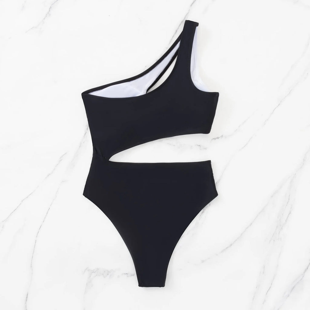 Black one-piece swimsuit with white contrast stitching and hollow cut-out details, front view, sleeveless design