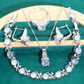 Four-piece bridal jewellery set showing zircon necklace, bracelet, earrings and ring with water wave chain design