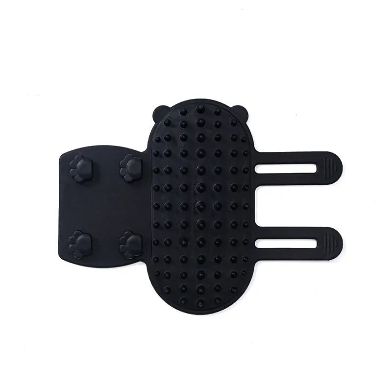 Silicone cat hair removal massage comb attached to a wall corner with rounded teeth for grooming