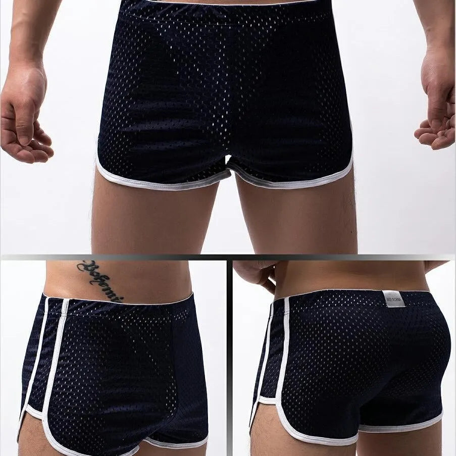 Men's cotton boxer shorts in multiple colours on a mid-waist fit model