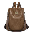 Women's black anti-theft backpack with multiple compartments and woven design details