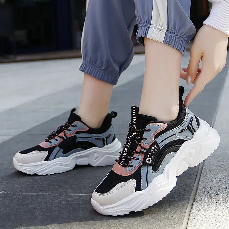White women's casual mesh sports shoes with a buckle and round toe on a thick PU sole.