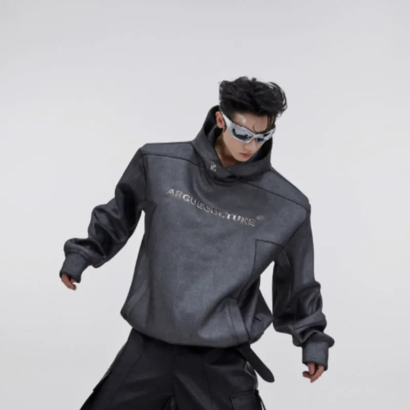 Men's loose fit red hooded sweater with raised three-dimensional printing on the front.
