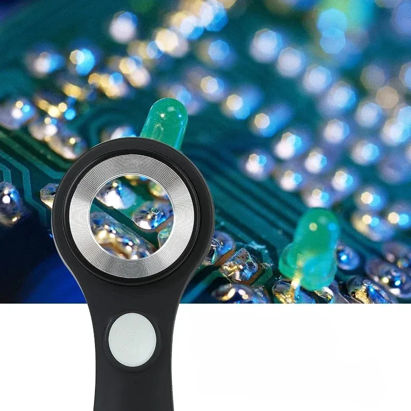 A black or silver appraisal magnifying glass with an optical glass lens and a USB-C charging cable.