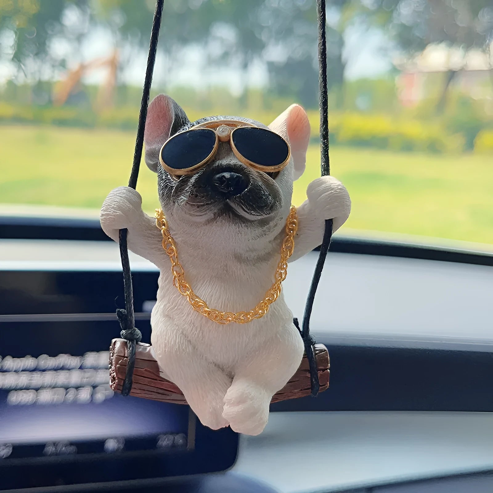 Resin cartoon bulldog car hanging ornament for rearview mirror in black, white, or yellow.