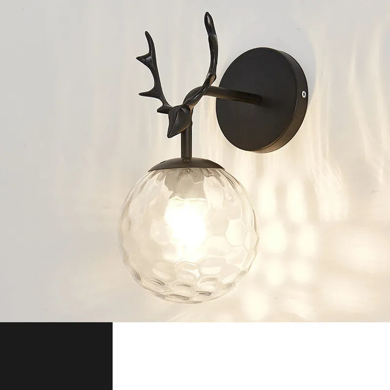 Minimalist round Nordic style glass wall lamp on a white wall