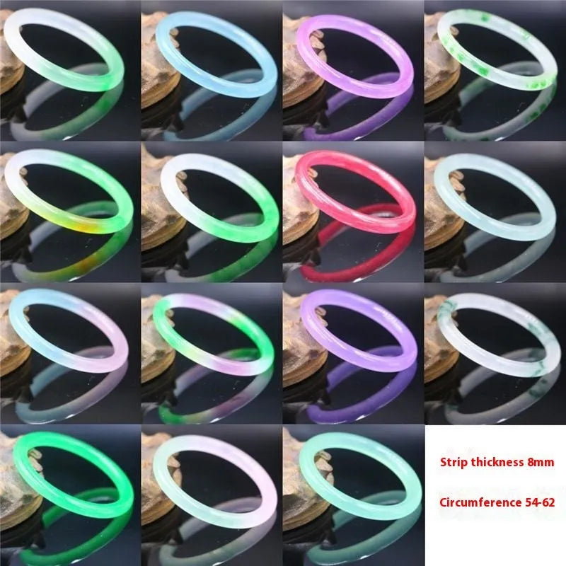 Women's jade bracelet with floating flower design in ice-like emerald appearance