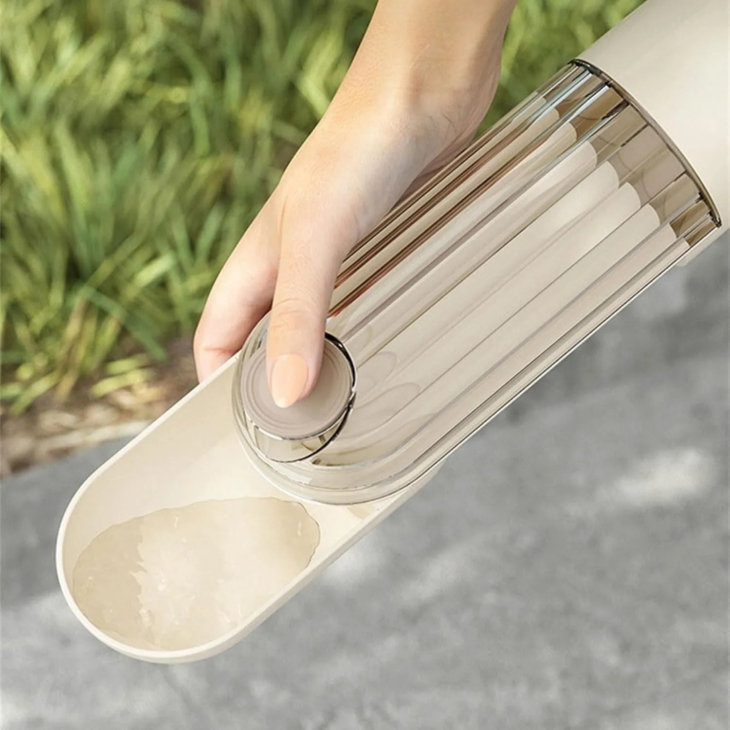 Foldable dog water bottle with food container in beige or green colour, showing drinking tray and dispenser mechanism