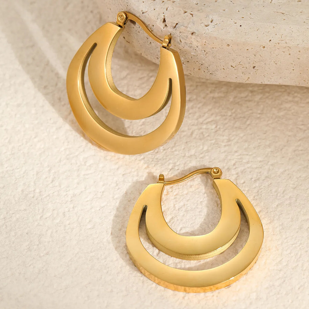 Geometric French earrings gold plated and steel plated minimalist jewellery with round ring elements