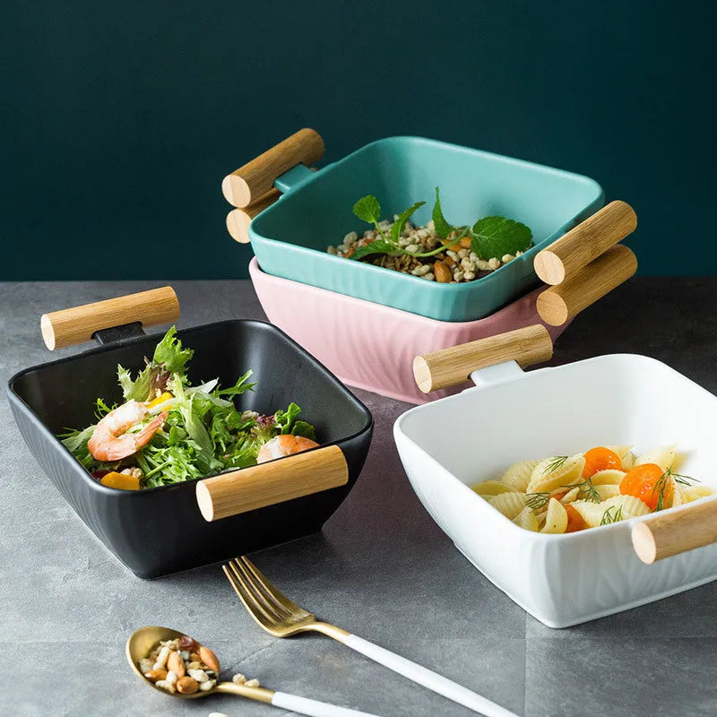 Porcelain ceramic bowl with lid in irregular shape design, shown in available colour options.