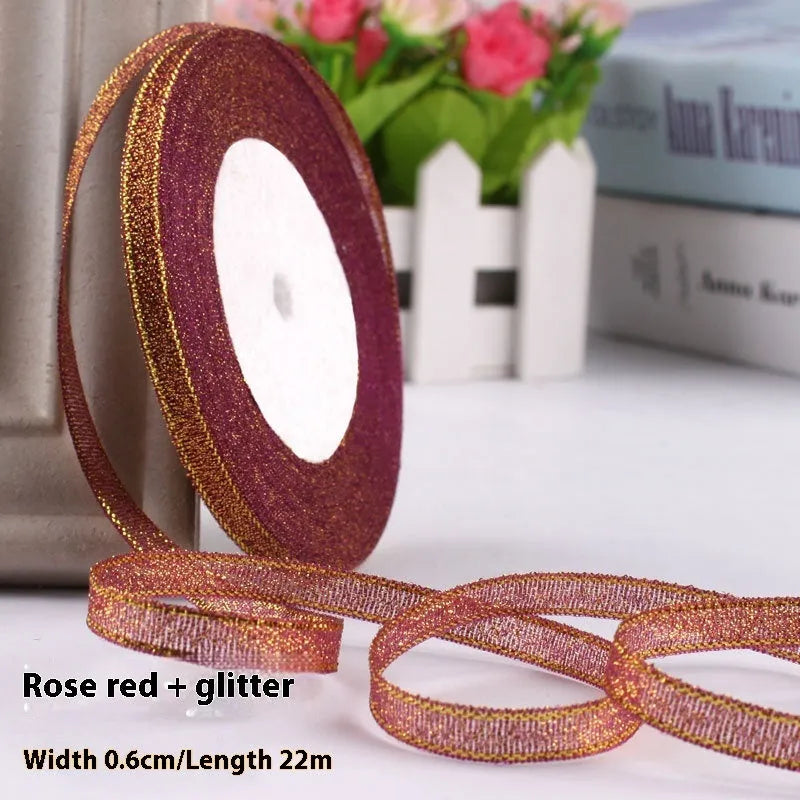Roll of 0.6cm wide polyester gift ribbon in various colours including gold leaf, coffee and sky blue options