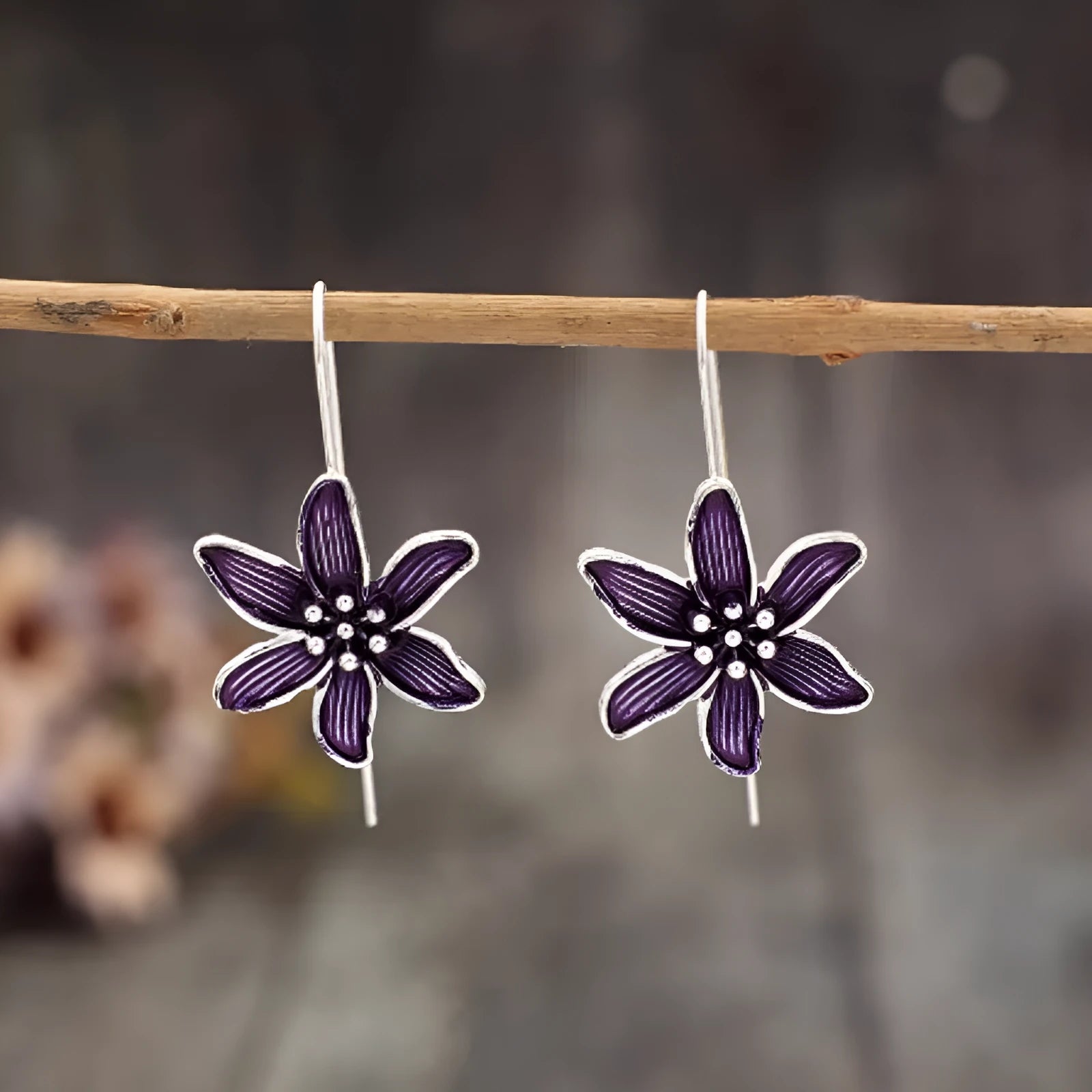 Purple flower-shaped alloy stud earrings with electroplated finish
