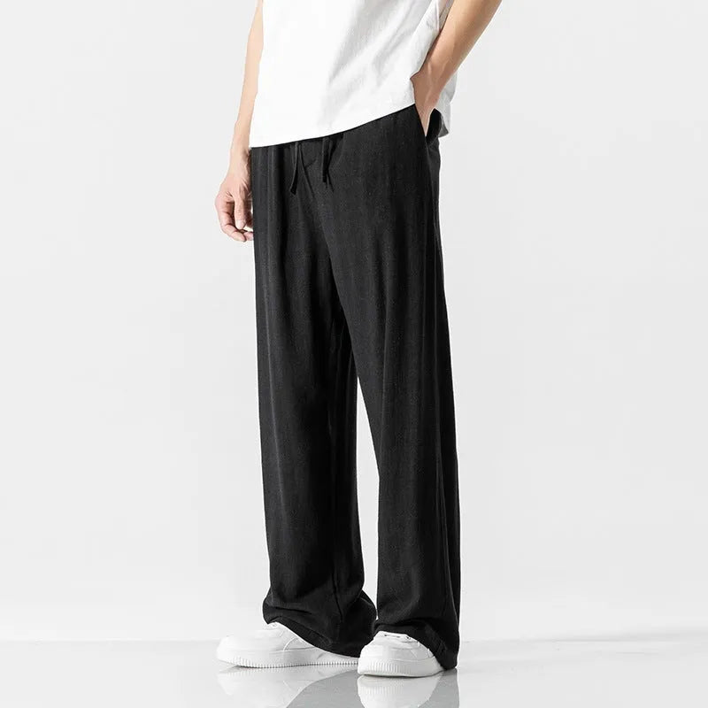 Men's bamboo fibre summer trousers in loose straight-leg cut with cropped length and drawstring waist
