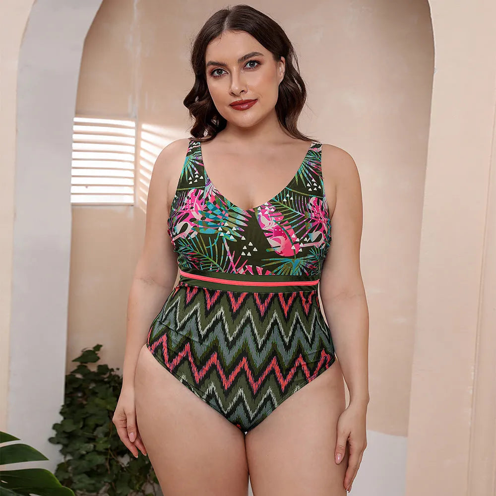 Women's printed spaghetti strap one-piece swimsuit in blue, white, and green patterns with vest style