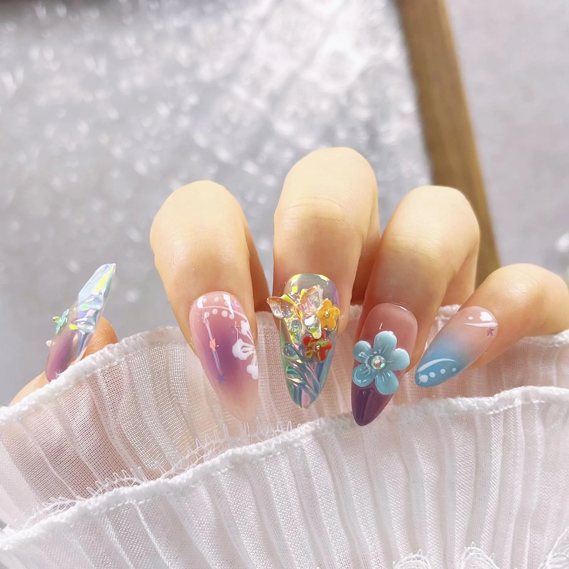 Handmade colourful butterfly wear manicure sculpture with floral patterns and embossed details