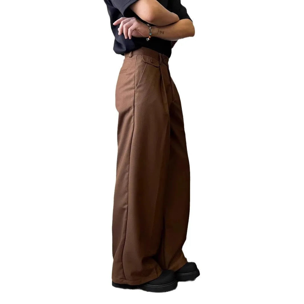 Men's brown wide-leg straight-cut casual trousers made from a polyester blend fabric on a hanger.