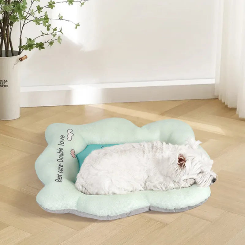 Green pet cooling mat for dogs and cats with fabric cover, shown next to a tape measure indicating its size.