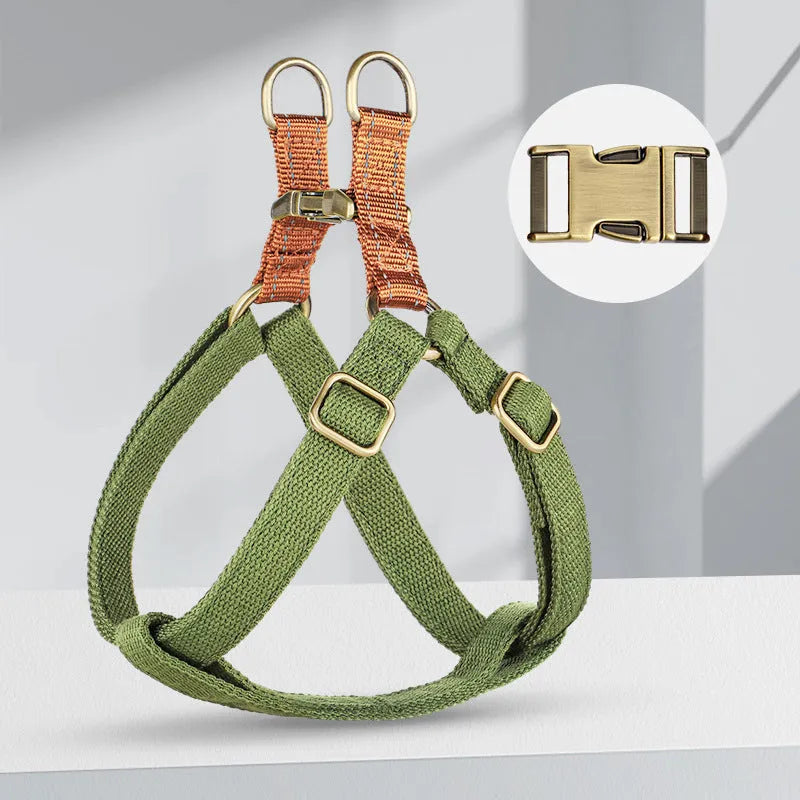 Brown vest-style anti-loss dog leash for a small dog, showing cotton belt and alloy fastener.