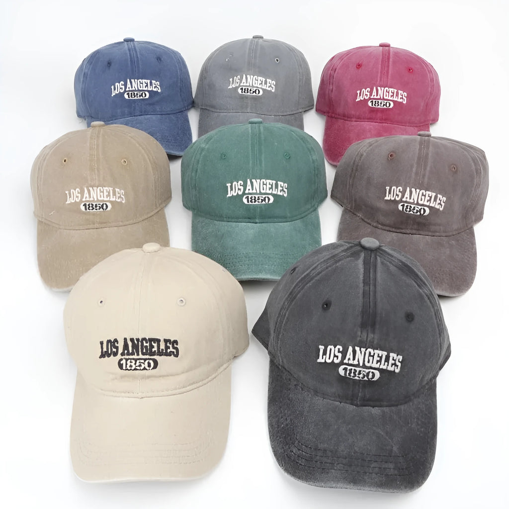 Retro personalised distressed embroidered peaked cap in beige colour with adjustable strap and conical crown.