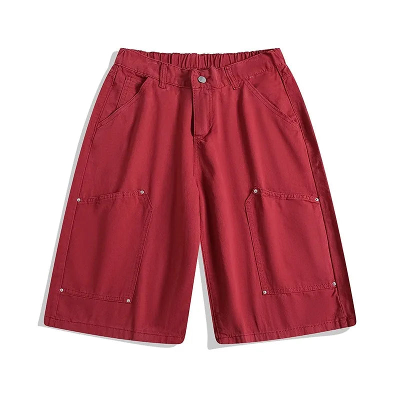 Casual wide-leg cropped shorts in apricot colour with mid waist and micro-elastic fabric.