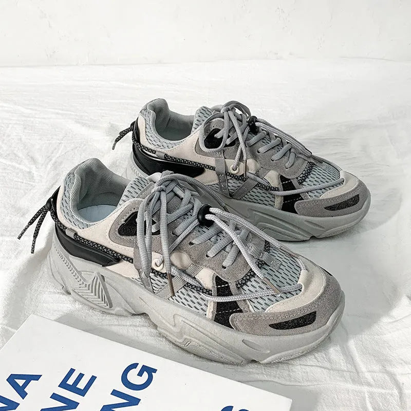 Men's white platform dad shoes with lace-up front, shown on a light background