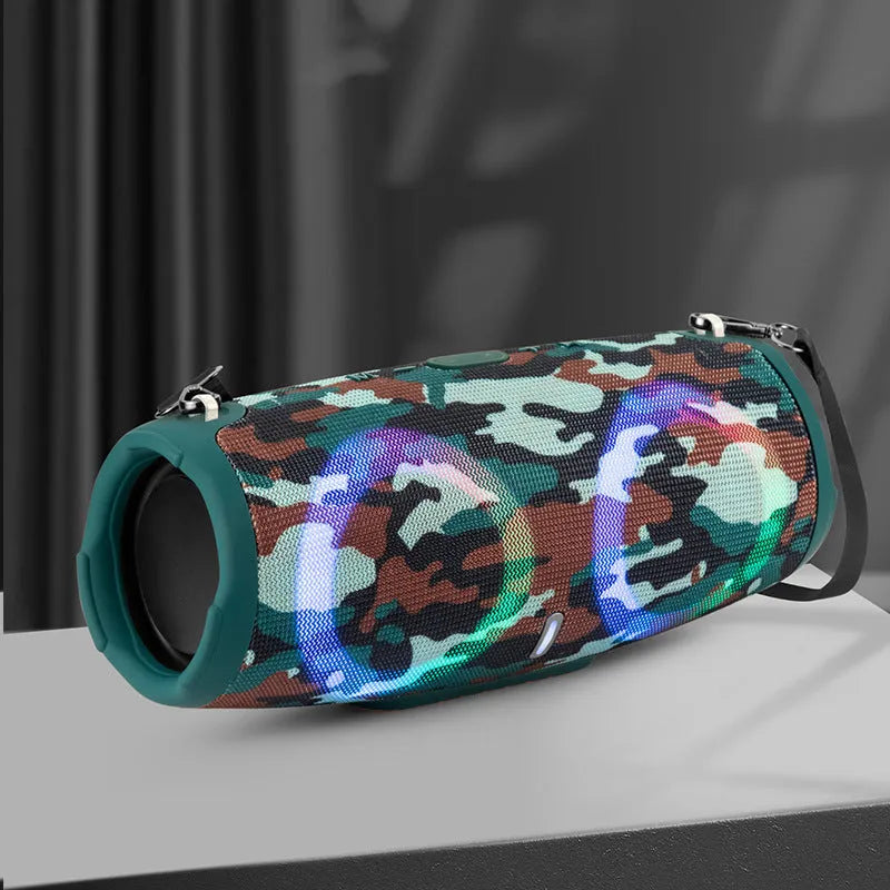 War Drum portable Bluetooth speaker with RGB coloured lights in outdoor setting